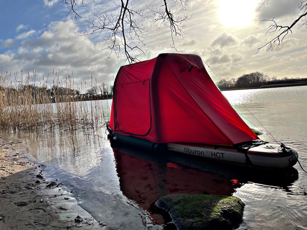BAJAO Cabin Tent on a sup- board fixed with leash on water