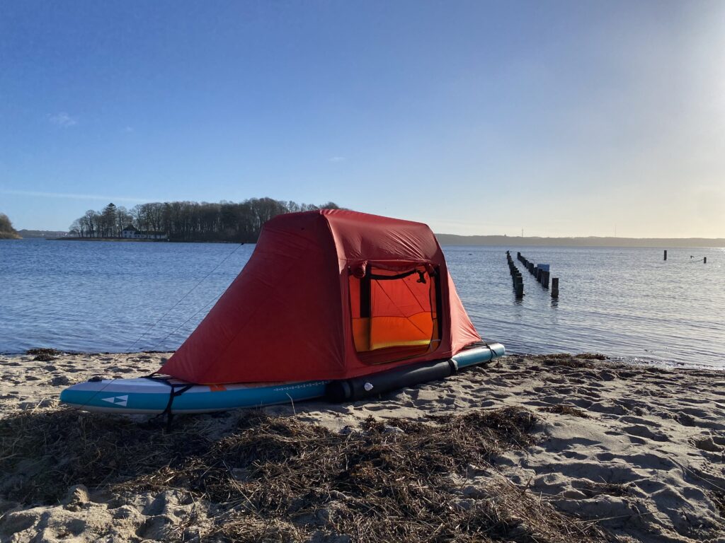 BAJAO Cabin tent on a Sic Sup Board on beach